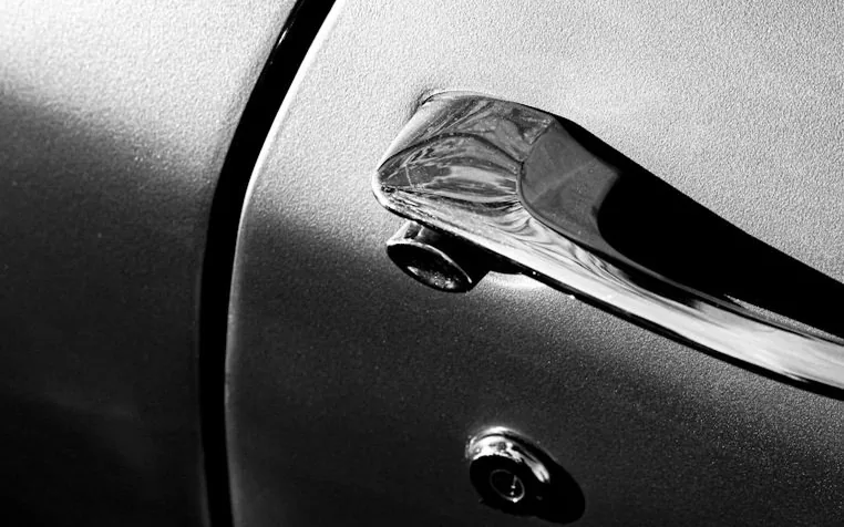 a car door lock — article card