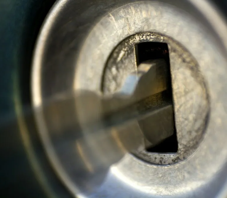 a key in the ignition, close