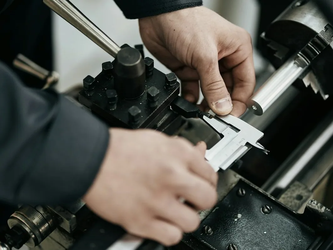a key being cut at the vehicle